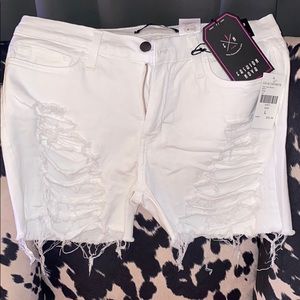 White cut off shorts